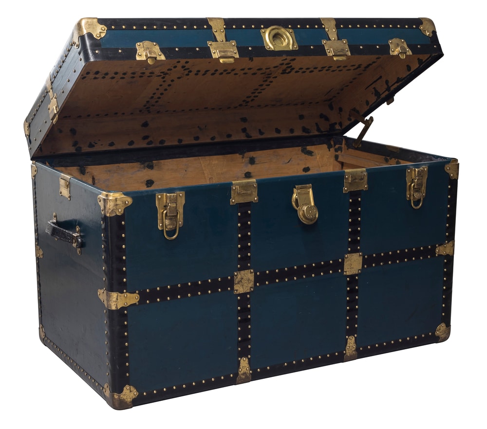 A view of a half opened blue storage trunk