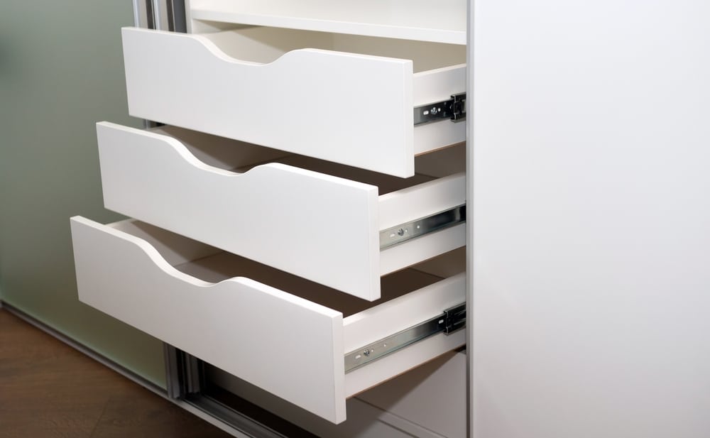 A view of white compartment drawers