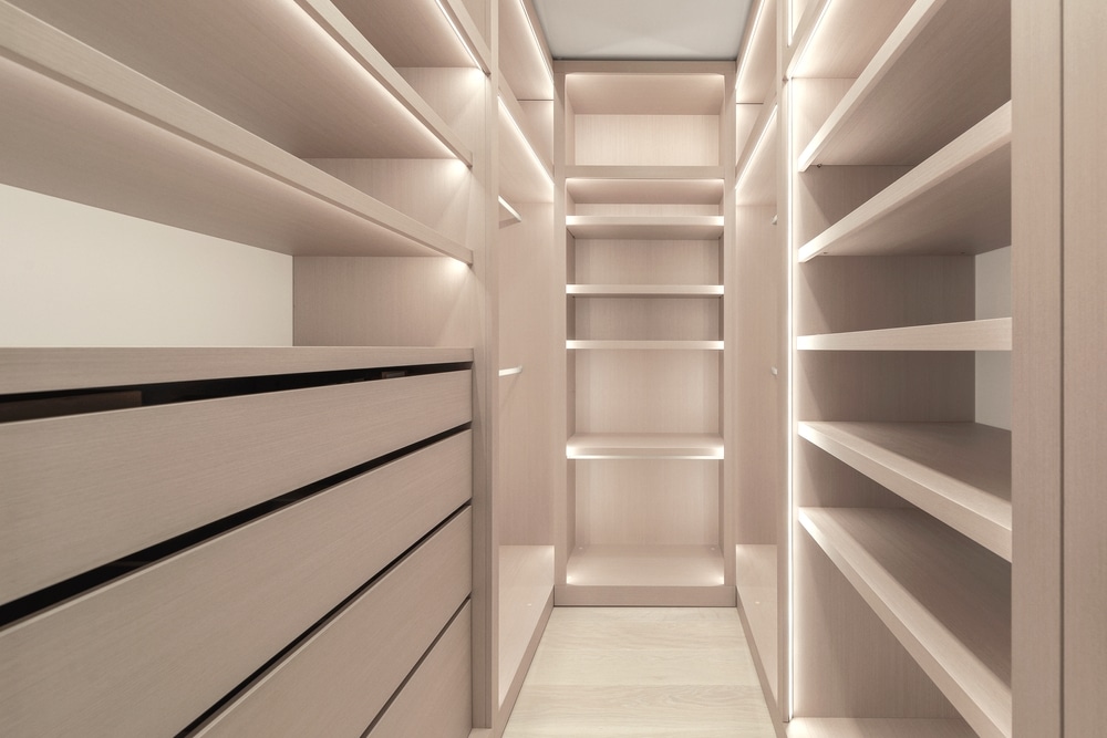 A view of white shelves for storage