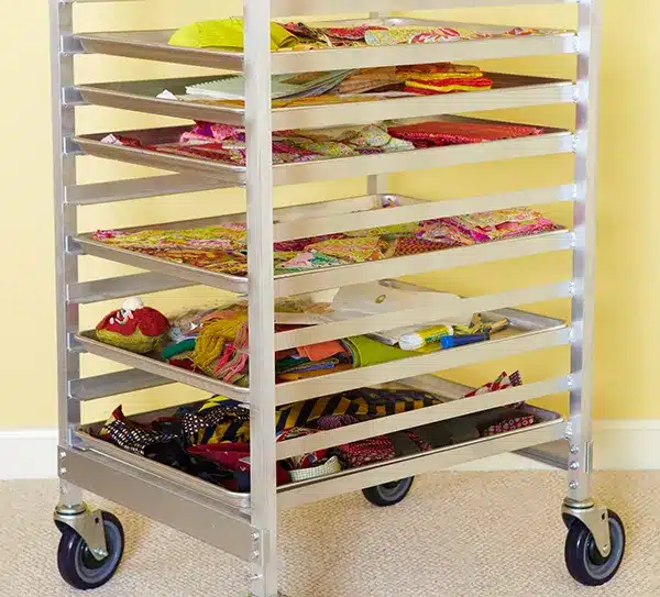 A view of fabrics stored in a bakers's wheel trolley