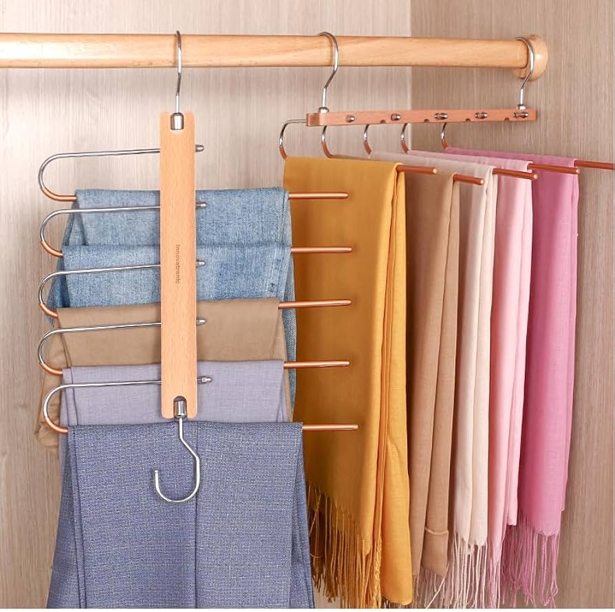 A view of scarves hung on a pant hanger for storage