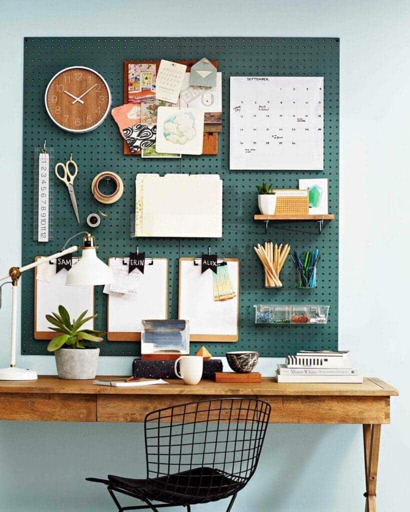 pegboards on the wall stationary and decorative items hung on it