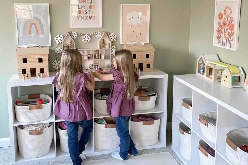 playroom storage with repurposed organizers two girls playing