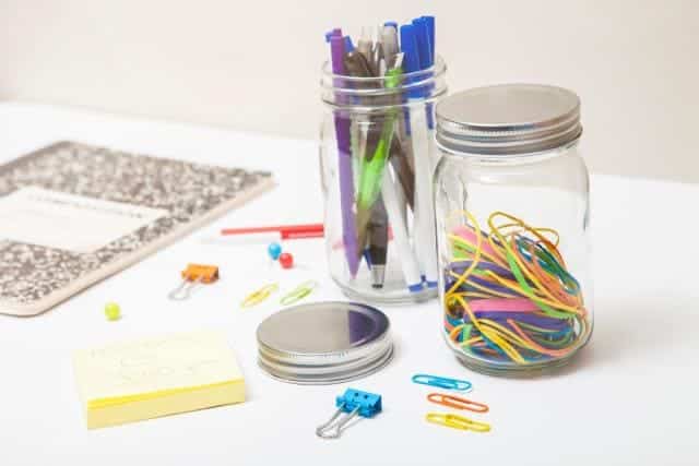 stationary placed in clear jars