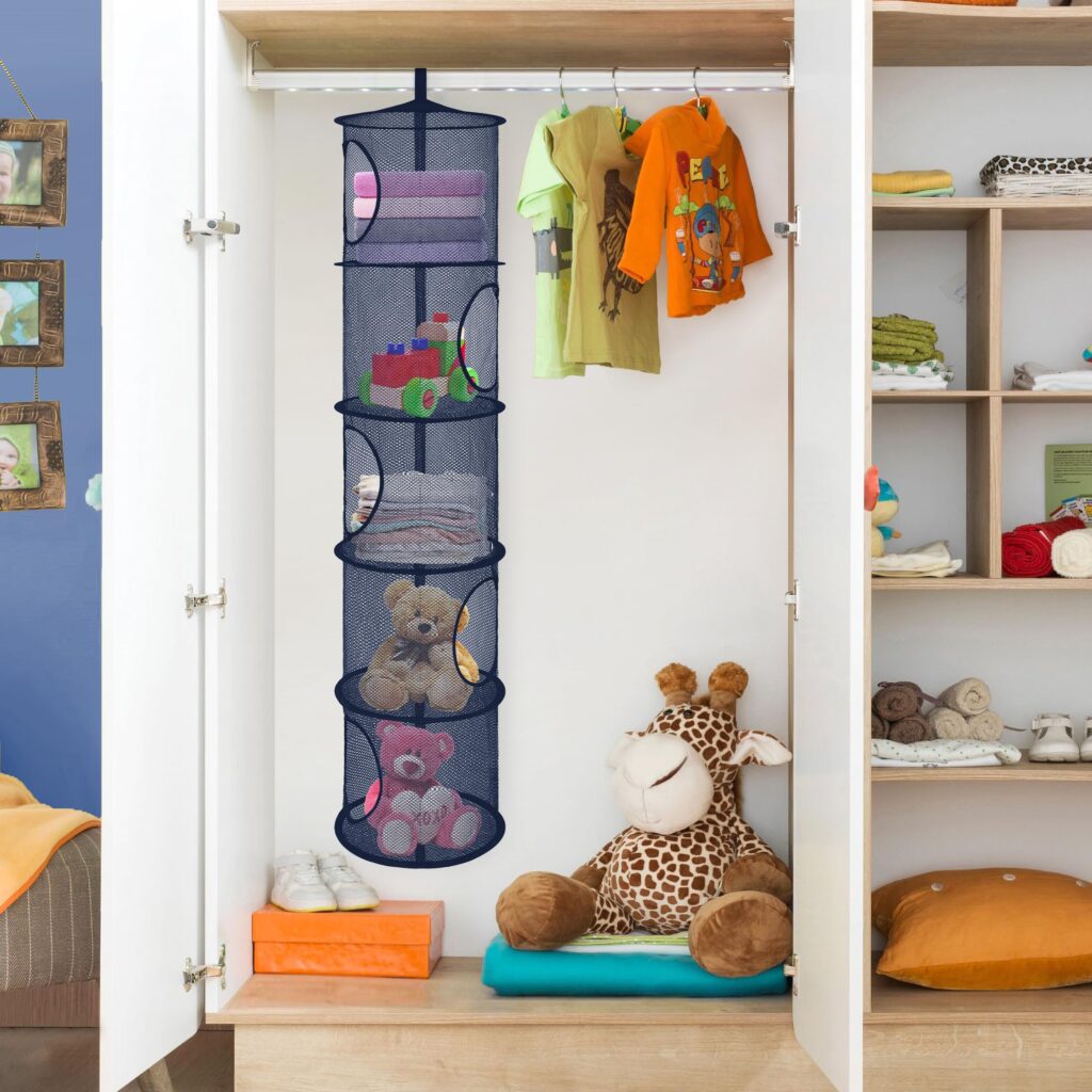 hanging organizer in a cupboard with stuffed toys arranged in it