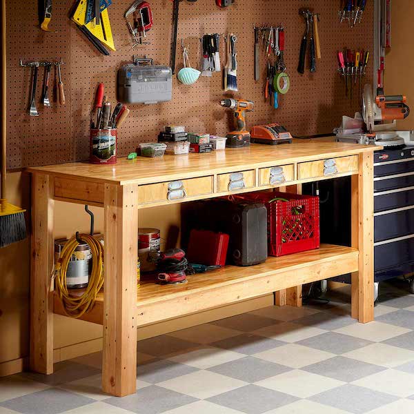 items organized on pegboards and beneath the bench