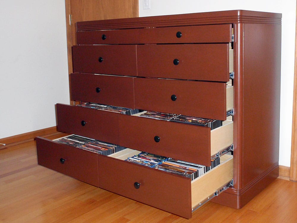 media storage cabinets with DVDs arranged in them