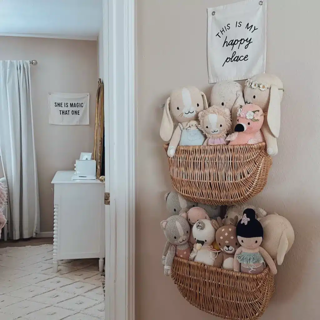 plush toys arranged in baskets on the wall