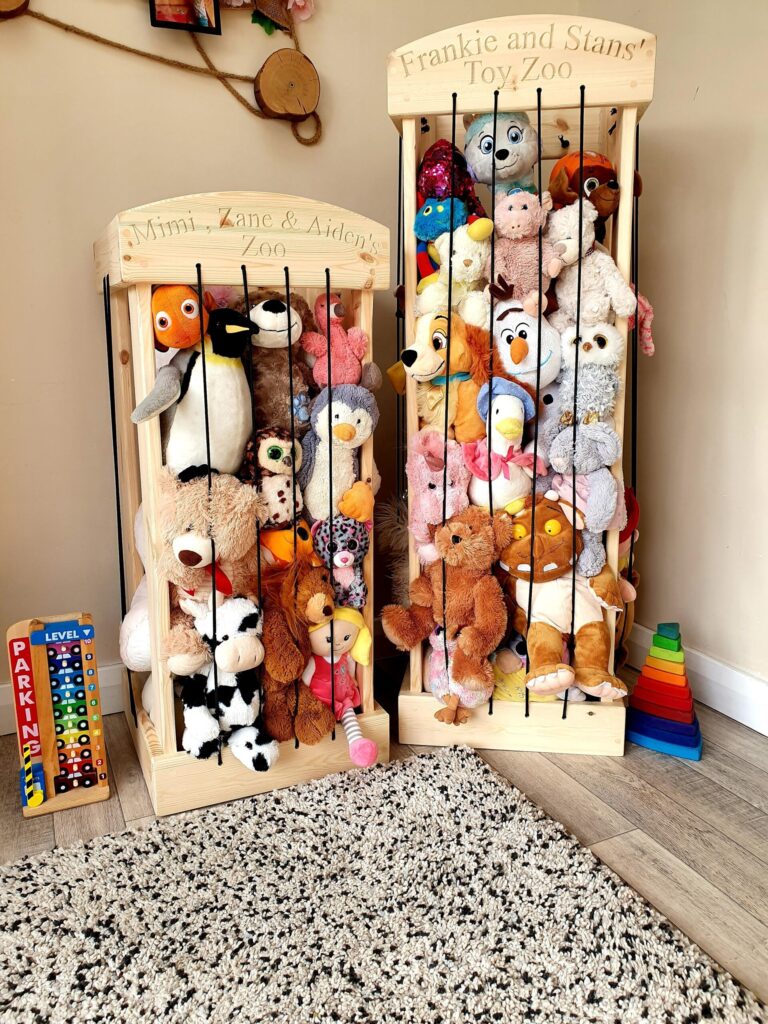 stuffed toy zoo placed in a corner of room