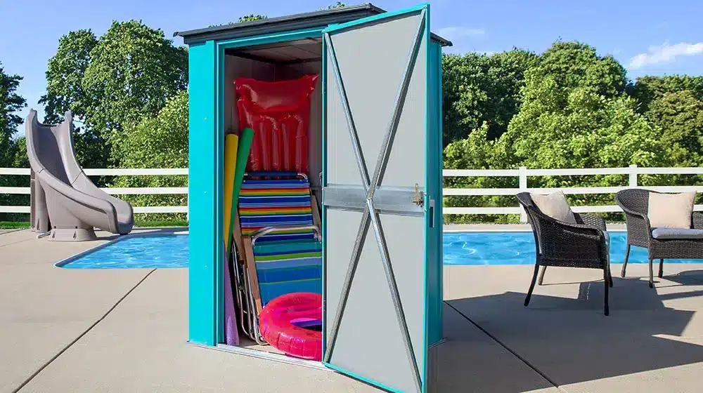 A view of a pool side with a storage cabinet keeping items