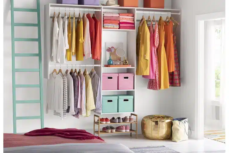 A view of clothes hung inside a closet