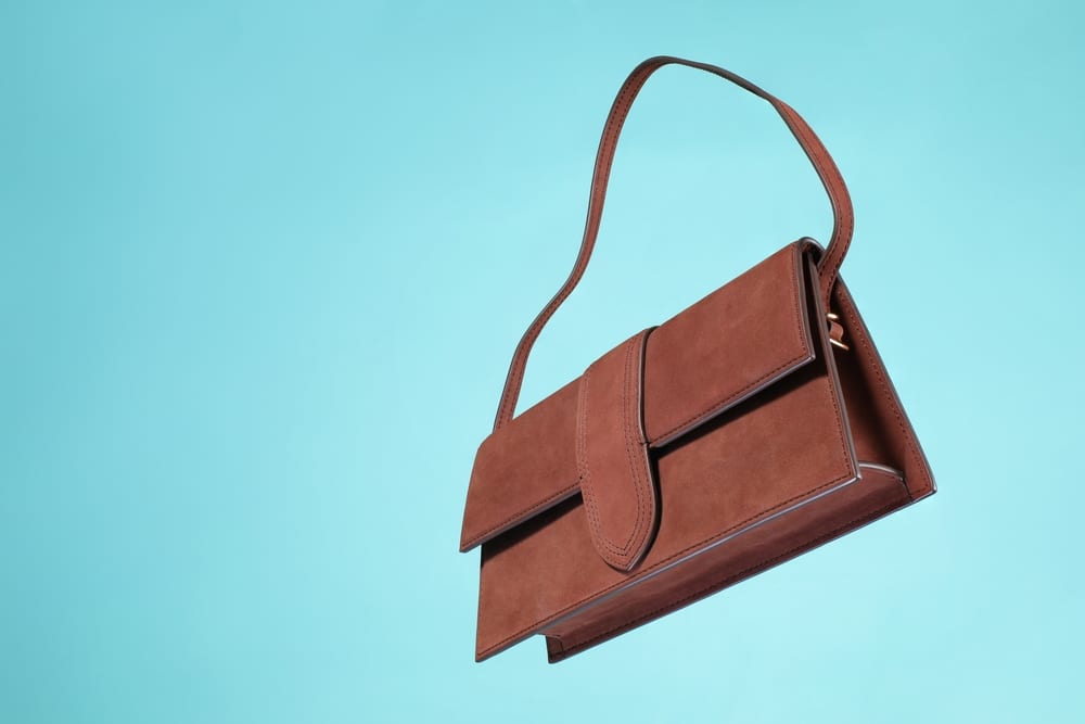 A view of a brown purse