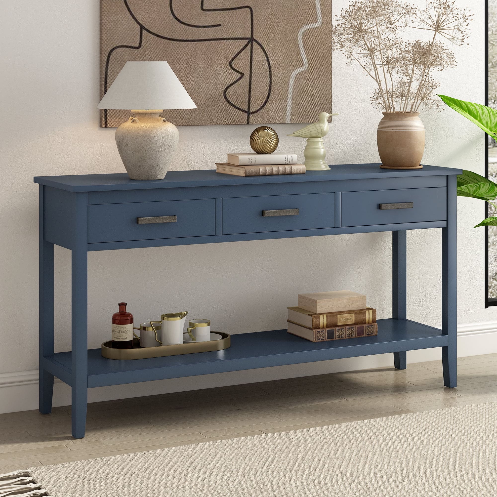 A view of a console table with items kept on it