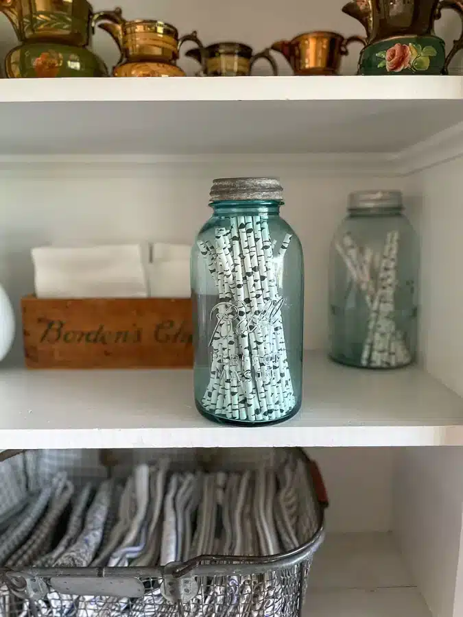 A view of a mason jar with pencils kept inside jpg