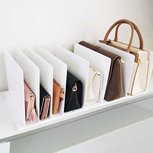 A view of bags kept inside shelf dividers