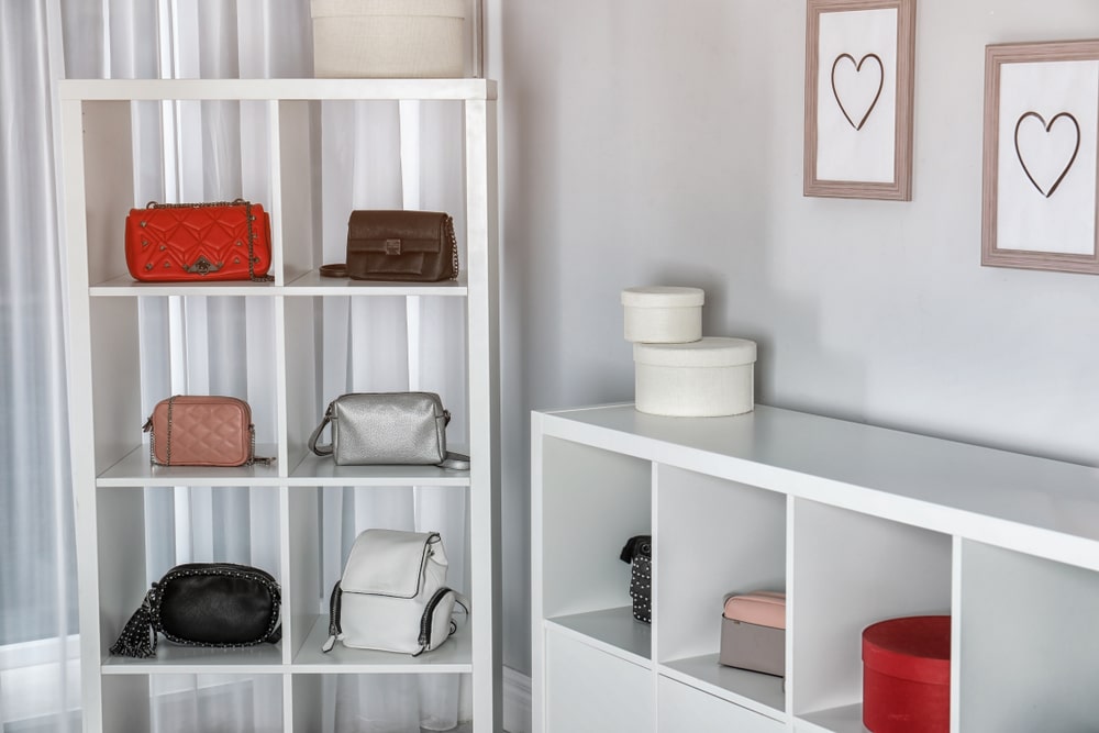 A view of purses stored inside cubbies