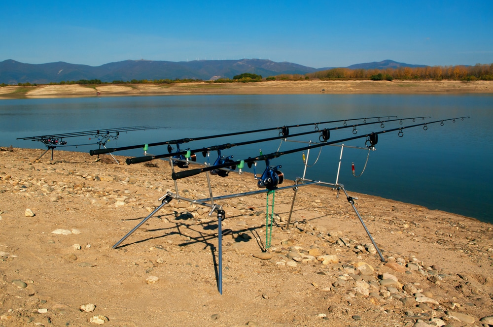 A view of fishing rods on racks by the sea