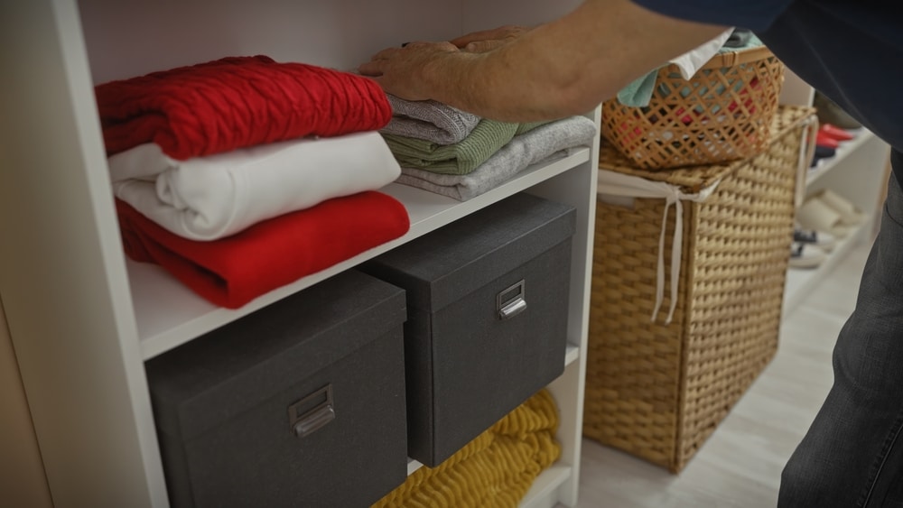 A view of bins for laundry storage