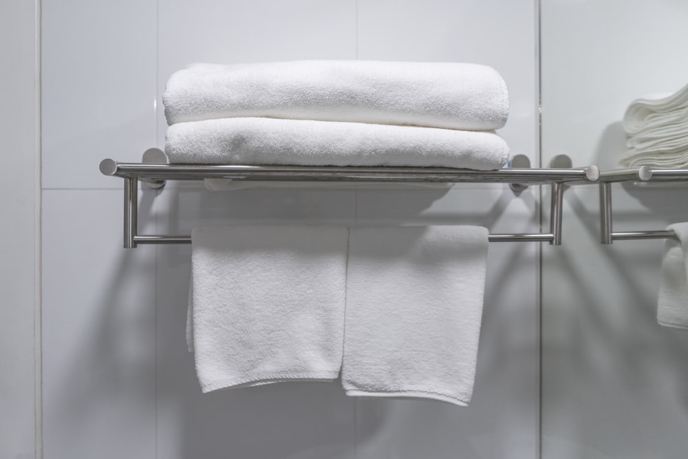 A view of a two tier bathroom towel rack